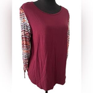 Dept222 Burgundy top with Aztec sleeves. Size Large
